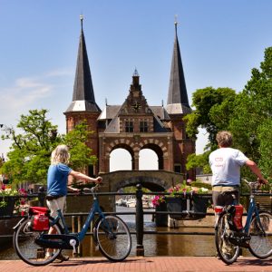 Sneek Waterpoort (Water gate) cyclists Friesland