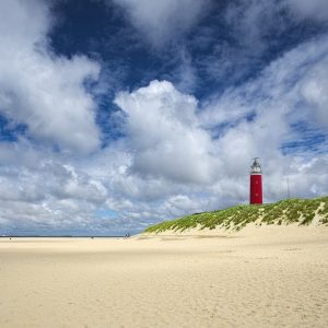 Lighthouse with the beach on Texel