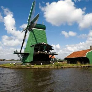 Windmill in Zaanse Schans with water around