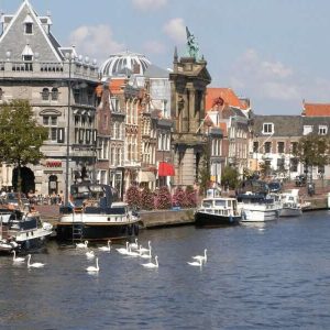 Haarlem with boats, water and swans