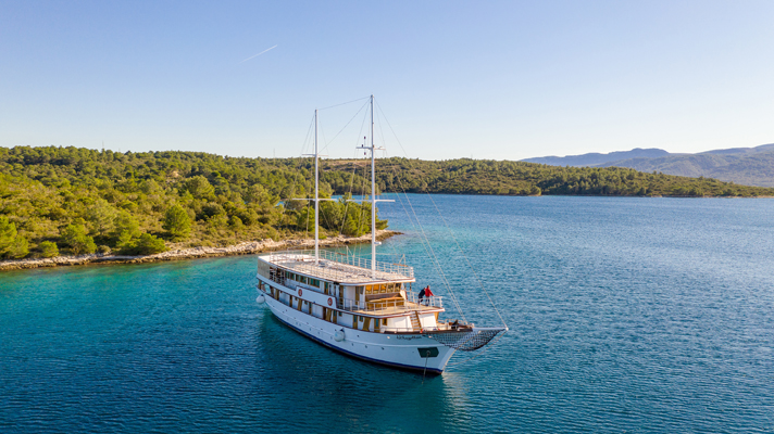 Sailing ship with bright blue sky on a lake in Croatia