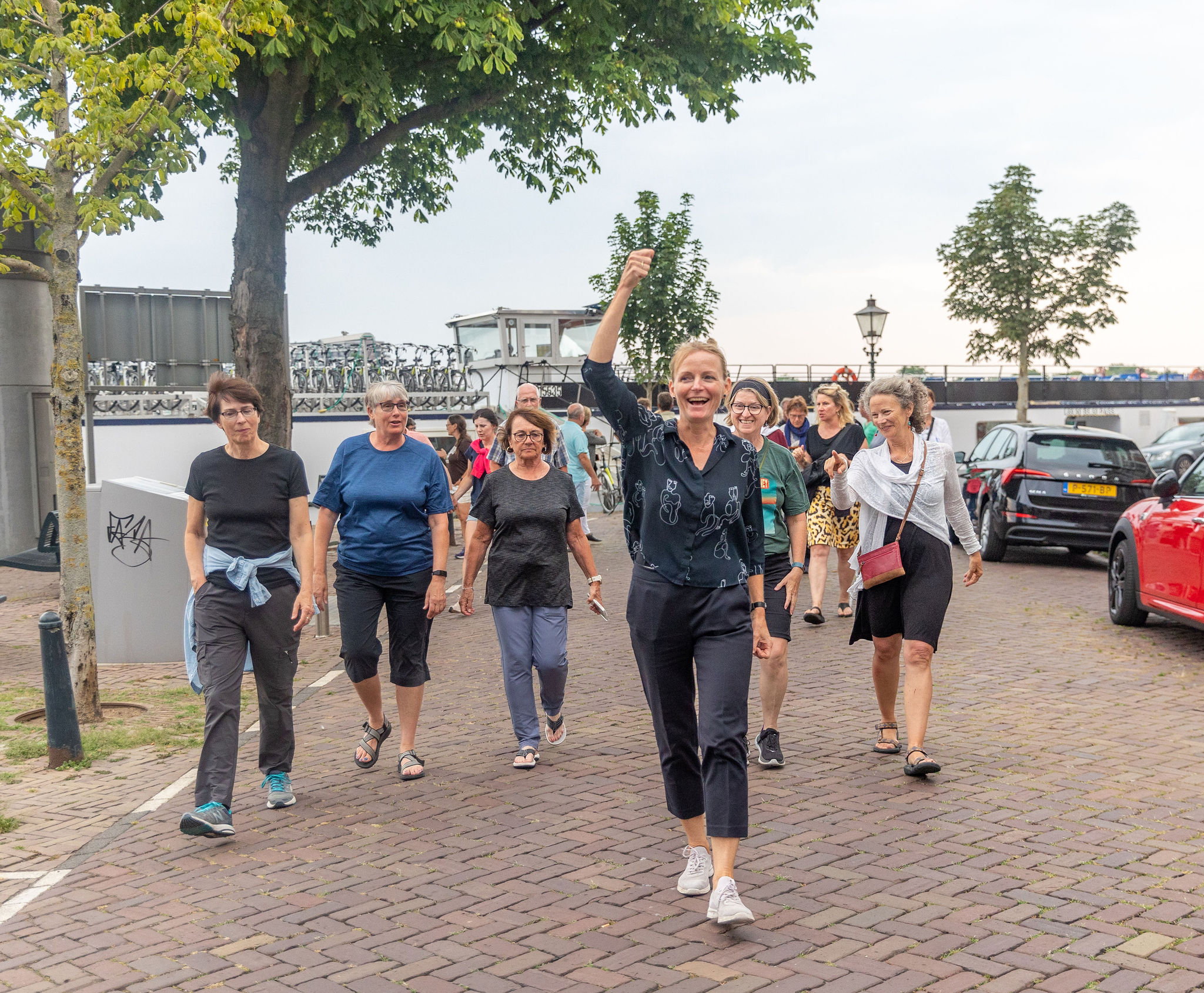 A group of people walking towards the camera
