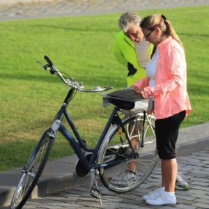 Cyclists studying a map