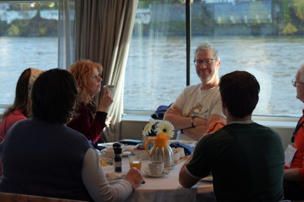 Group having breakfast on the Arkona