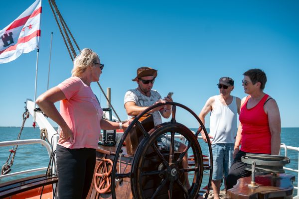 People steering the ship